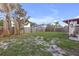 The large, fenced backyard offers privacy and plenty of room for recreation or gardening at 10337 River Bream Dr, Riverview, FL 33569