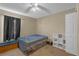 Bedroom with carpet, ceiling fan, and window at 10337 River Bream Dr, Riverview, FL 33569