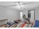 Bedroom with carpet, ceiling fan, and a closet at 10337 River Bream Dr, Riverview, FL 33569