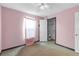 Cozy bedroom featuring a ceiling fan and a closet with ample storage space at 10337 River Bream Dr, Riverview, FL 33569