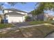 Two-story home featuring a two-car garage and well-maintained front lawn and driveway at 10337 River Bream Dr, Riverview, FL 33569