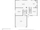 Detailed first floor plan showcasing the layout of the living room, kitchen, dining room, and garage at 10337 River Bream Dr, Riverview, FL 33569
