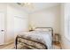 Comfortable bedroom featuring a closet and light hardwood floors at 10536 Shady Preserve Dr, Riverview, FL 33579