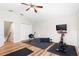 Spacious workout area featuring hardwood floors and exercise machines at 10536 Shady Preserve Dr, Riverview, FL 33579