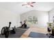 Bright exercise room with workout equipment and ample natural light at 10536 Shady Preserve Dr, Riverview, FL 33579