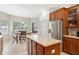 Open-concept kitchen and breakfast nook with stainless steel appliances and ample sunlight at 10536 Shady Preserve Dr, Riverview, FL 33579