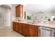 Spacious kitchen area with modern amenities and a convenient breakfast bar at 10536 Shady Preserve Dr, Riverview, FL 33579