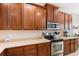 Well-lit kitchen featuring modern appliances and sleek countertops at 10536 Shady Preserve Dr, Riverview, FL 33579