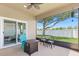 Relaxing screened patio with ceiling fan, patio furniture, and open backyard view for enjoying the outdoors at 10536 Shady Preserve Dr, Riverview, FL 33579