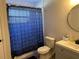 Modern bathroom features a vanity and a shower-tub combination at 10826 Rain Lilly Pass, Land O Lakes, FL 34638