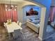 Modern dining area with sleek furniture and decor, perfect for entertaining guests at 10826 Rain Lilly Pass, Land O Lakes, FL 34638