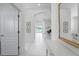 Bright and airy foyer with tiled flooring and an open layout, creating a welcoming atmosphere at 1130 Hominy Hill Dr, Trinity, FL 34655