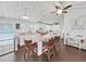 Beautiful kitchen with a large island and stylish bar stool seating at 11337 Knights Griffin Rd, Thonotosassa, FL 33592