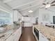 Spacious kitchen featuring granite countertops and updated appliances at 11337 Knights Griffin Rd, Thonotosassa, FL 33592