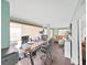 Spacious office with hardwood floors, neutral colors, and lots of natural light at 11337 Knights Griffin Rd, Thonotosassa, FL 33592