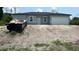 New construction home featuring a blank slate yard and two car garage, ready for customization at 11369 Gulfstream Blvd, Port Charlotte, FL 33981