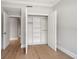 A well-lit bedroom closet with ample storage and shelving at 12 Country Club Ln, Belleair, FL 33756