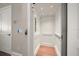 Interior elevator features a minimalist design and wood flooring at 12 Country Club Ln, Belleair, FL 33756