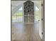 Living room with fireplace and scenic views at 14510 Mj Rd, Myakka City, FL 34251