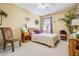 Inviting bedroom with carpet, a plush bed, and soft natural light creating a relaxing and peaceful atmosphere at 15202 Heathridge Dr, Tampa, FL 33625