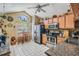 Well-lit kitchen featuring stainless steel appliances, tile floors, and ample counter space for meal preparation at 15202 Heathridge Dr, Tampa, FL 33625