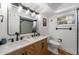 Bathroom featuring double sink vanity, a light up mirror, and modern fixtures at 1546 69Th S Pl, St Petersburg, FL 33705