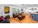 Bright living room with hardwood floors, recessed lighting, and plenty of natural light at 1546 69Th S Pl, St Petersburg, FL 33705