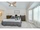 Comfortable bedroom with a cozy bed, dark wood nightstands, and soft carpeting at 1603 Scotch Pine Dr, Brandon, FL 33511