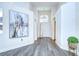 Grand foyer with hardwood floors, high ceilings, and elegant decor at 1603 Scotch Pine Dr, Brandon, FL 33511