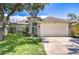 Charming single-story home with a well-manicured lawn and inviting curb appeal, offering comfortable living at 1603 Scotch Pine Dr, Brandon, FL 33511