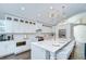 Modern kitchen featuring stainless steel appliances and a spacious island with seating at 1603 Scotch Pine Dr, Brandon, FL 33511