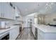 Gourmet kitchen with stainless appliances, stylish hardware and modern fixtures at 1603 Scotch Pine Dr, Brandon, FL 33511