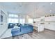 Cozy living area with ample seating and a seamless connection to the kitchen at 1603 Scotch Pine Dr, Brandon, FL 33511