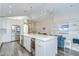 Open floor plan connecting the kitchen, living room, and dining area at 1603 Scotch Pine Dr, Brandon, FL 33511