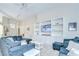 Bright living room with custom built-ins and comfortable seating arrangement at 1603 Scotch Pine Dr, Brandon, FL 33511