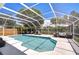 Beautiful screened-in pool with outdoor seating, providing an ideal space for leisure and entertainment at 1603 Scotch Pine Dr, Brandon, FL 33511
