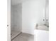 This bathroom has a tiled shower and room for a vanity to be installed at 16134 Libourn Ave, Port Charlotte, FL 33954