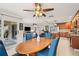 An open-concept design with a dining area, living room, and kitchen at 1880 Oak Bark Ct, Clearwater, FL 33763