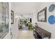 Inviting entryway featuring neutral tones, tile floors, and decorative accents at 1880 Oak Bark Ct, Clearwater, FL 33763