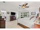Spacious main bedroom featuring neutral tones, tile flooring, and bay windows at 1880 Oak Bark Ct, Clearwater, FL 33763