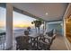 Balcony features ocean view with outdoor seating, perfect for enjoying the sea breeze at 2 Gulf Blvd, Indian Rocks Beach, FL 33785