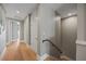Bright hallway featuring beautiful hardwood floors and doors at 2 Gulf Blvd, Indian Rocks Beach, FL 33785