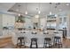 Gourmet kitchen features marble counters, stainless steel appliances, and a large island with bar seating at 2 Gulf Blvd, Indian Rocks Beach, FL 33785