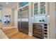 Kitchen features include stainless steel appliances, wine fridge and custom cabinets at 2 Gulf Blvd, Indian Rocks Beach, FL 33785