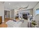 Relax in this beautifully decorated living room with a wet bar at 2 Gulf Blvd, Indian Rocks Beach, FL 33785