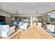 Open floor plan of the living room features ocean view, open to the dining and kitchen areas at 2 Gulf Blvd, Indian Rocks Beach, FL 33785