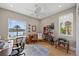 Bright home office with a water view, desk, and comfortable seating area at 2 Gulf Blvd, Indian Rocks Beach, FL 33785