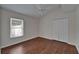 Bedroom with hardwood floors, a closet and a window at 2330 Lawrence Hall St, Ruskin, FL 33570