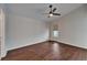 Bright bedroom featuring wood floors, a ceiling fan and a window at 2330 Lawrence Hall St, Ruskin, FL 33570