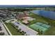Aerial shot of community amenities including a pool, playground, tennis and basketball courts at 2330 Lawrence Hall St, Ruskin, FL 33570